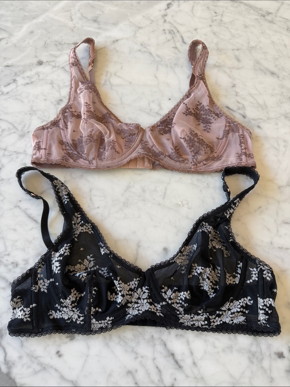 2 free people intimately lace bras. Black and white and mauve Never worn 36B